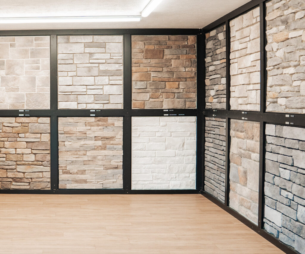 Stone veneer display wall showing cream, beige, and neutral undertone color variations.